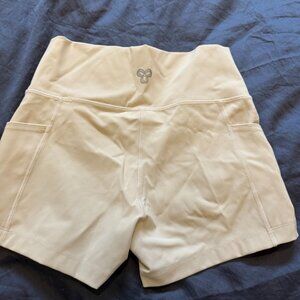 Aritzia TnaACTION Atmosphere Hi-Rise Shorts S Beige Oatmeal Side Pockets